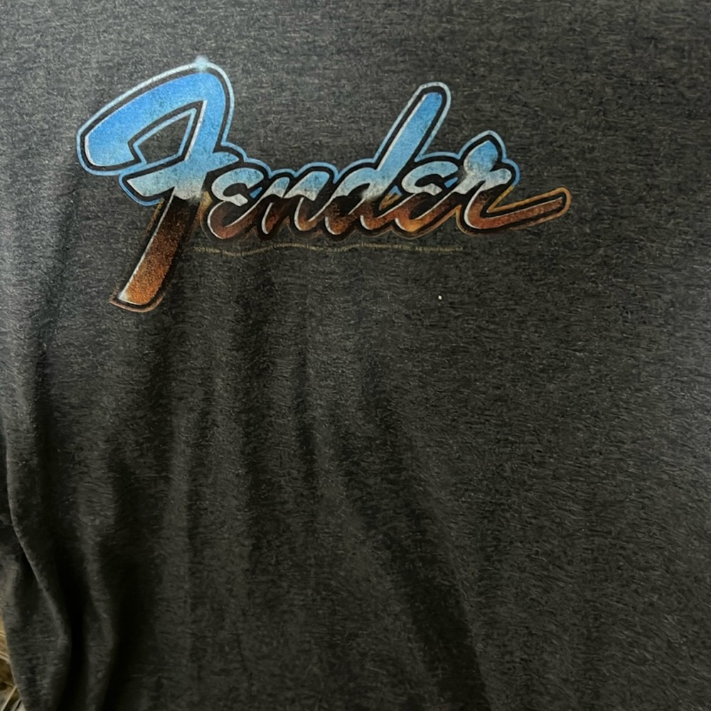 Gray Fender t shirt. Size is men’s small on a port company shirt.